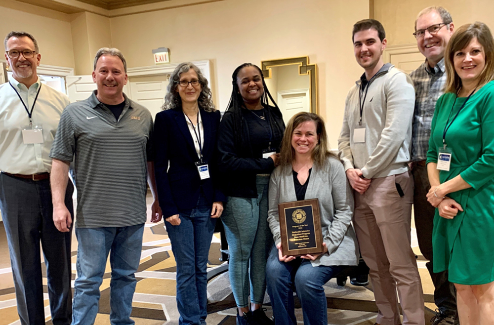 Association of Ambulatory Behavioral Healthcare officials (far left and far right) presenting Program of the Year to Princeton House outpatient leaders Alan Giordano, Jody Kashden, Nicole Glover, Jodi Pultorak, Pete Maclearie, and Peter Thomas.